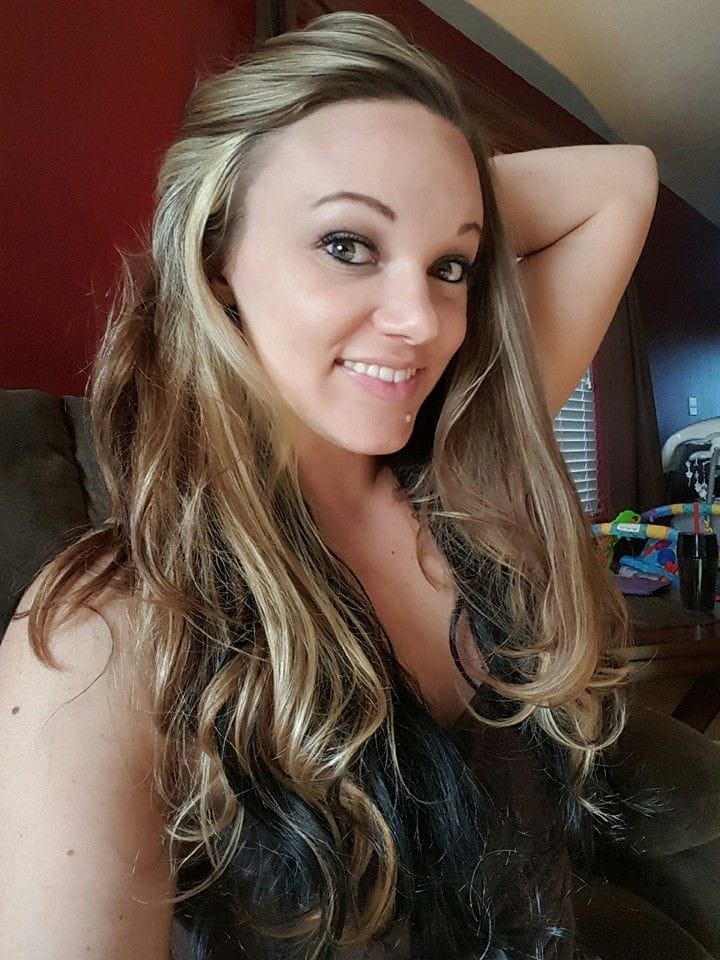 Two-toned hairstyle with blonde top highlights at Shear Perfections in Palmdale, CA